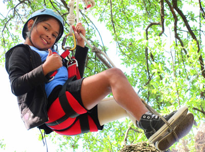 It’s “thumbs up” to tree climbing from the Scottish Rite Hospital for Children climbers.