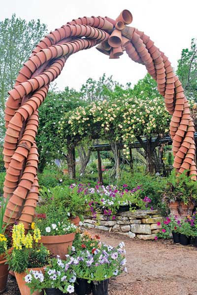 The entry arch at the Antique Rose Emporium, near Brenham, will welcome Fall Festival visitors this coming weekend.
