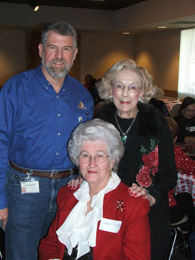 Henry Painter, at the 2005 Christmas Party, with two of the many ladies who helped to build the Fort Worth Botanic Garden.