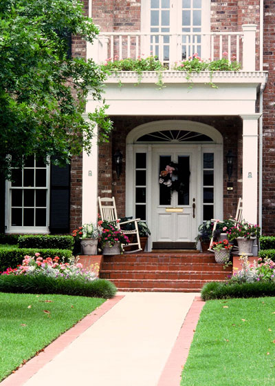 American homes and gardens . spacious lawn to themain doorway with its  splendid doors of bronze. The plant-ing of this front has been somewhat  simple and yet it is quitesufficient. Groups of